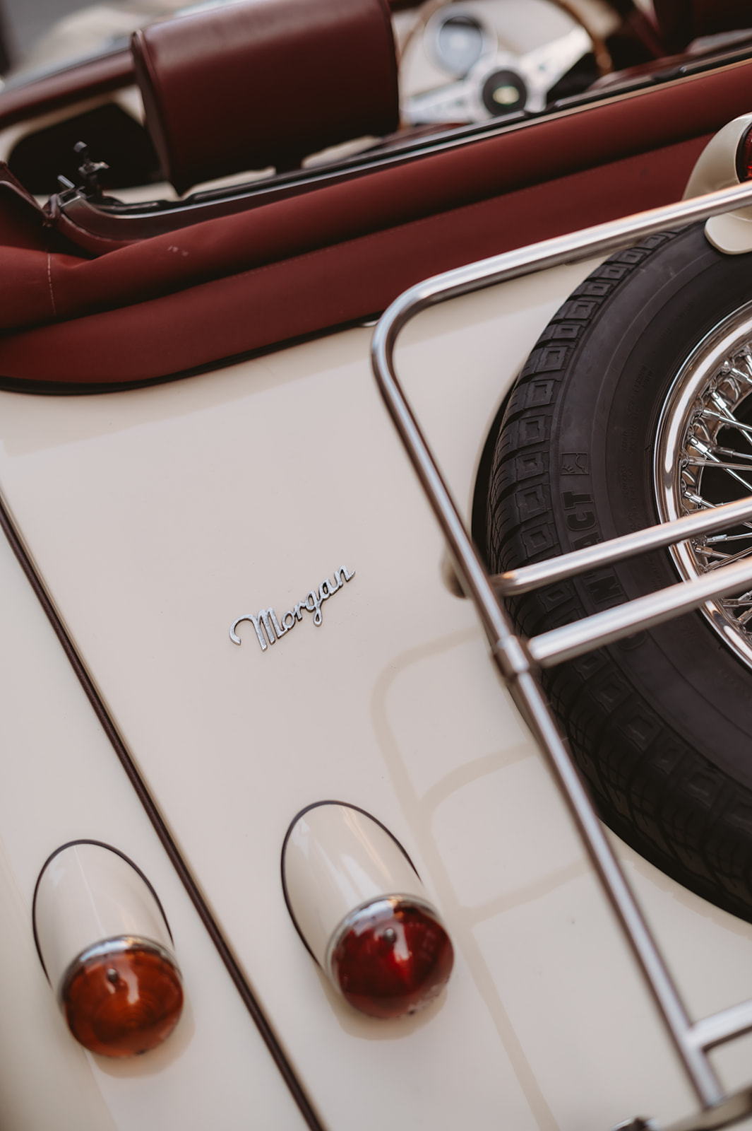 Morgan badge, ivory paintwork and burgundy hood detail